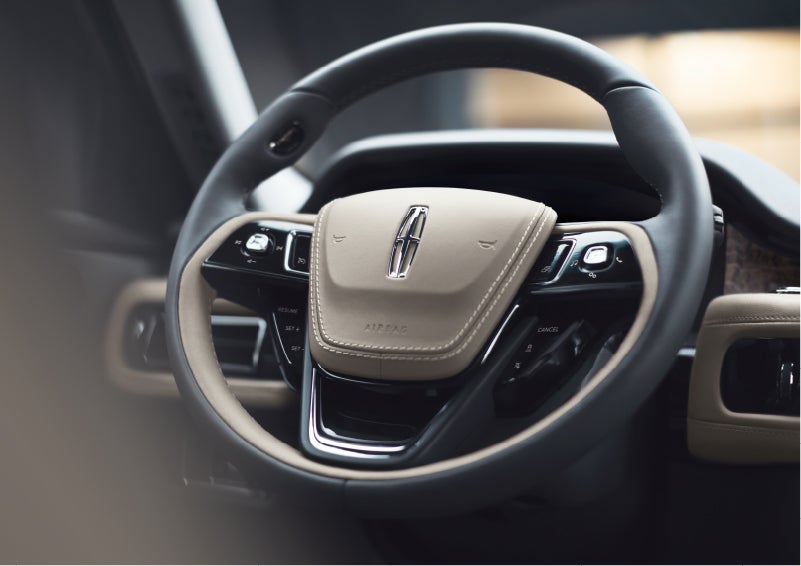 The intuitively placed controls of the steering wheel on a 2023 Lincoln Aviator® SUV | Brinson Lincoln of Athens in Athens TX