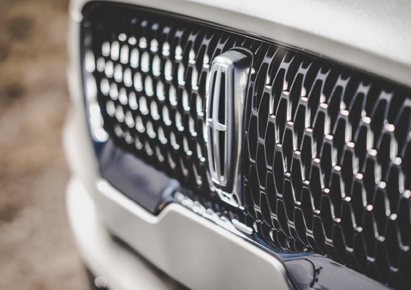 The grille of the 2024 Lincoln Aviator® Reserve model with an eye-catching repeated field of Lincoln Star logo shapes | Brinson Lincoln of Athens in Athens TX